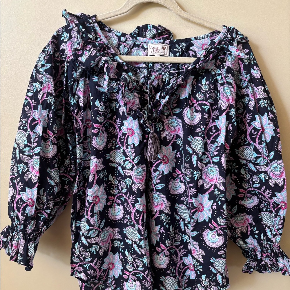 Long sleeve floral shirt. Size medium.